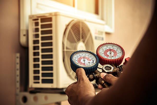 Professional Ac Installation technician working in Norton, MA